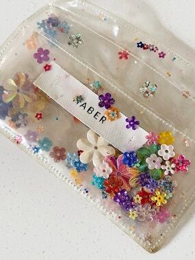 Advisory Board Crystals Floral Sequin Clear Card Holder